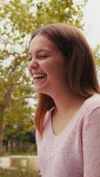Happy Girl Laughs Heartily At A Joke Of Her Friend In The Public Park video